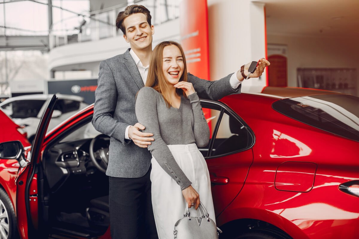 Couple,buying,the,car.,pair,in,a,car,salon.,husband