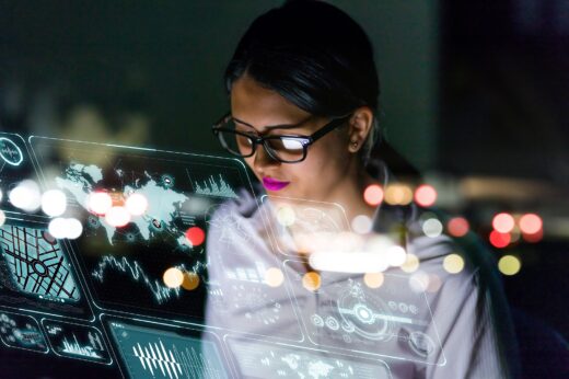 Businesswoman,looking,at,futuristic,interface,screen.