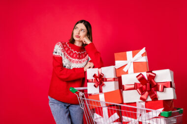 Photo,of,charming,doubtful,young,lady,wear,print,sweater,buying
