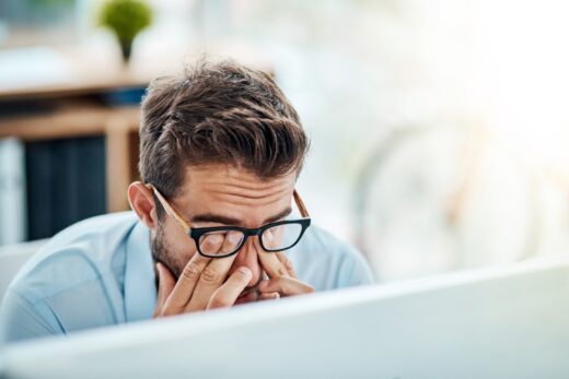 Business,man,,headache,and,pain,,tired,or,fatigue,in,office
