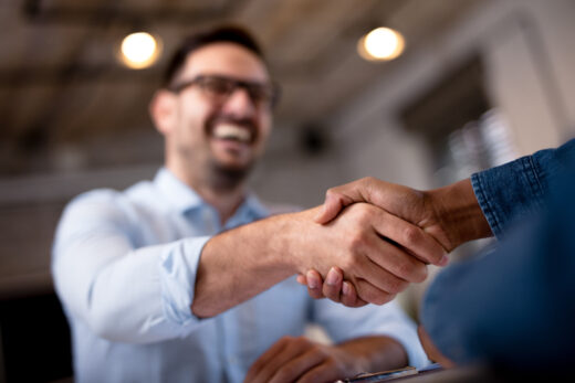 Business,people,shaking,hands.