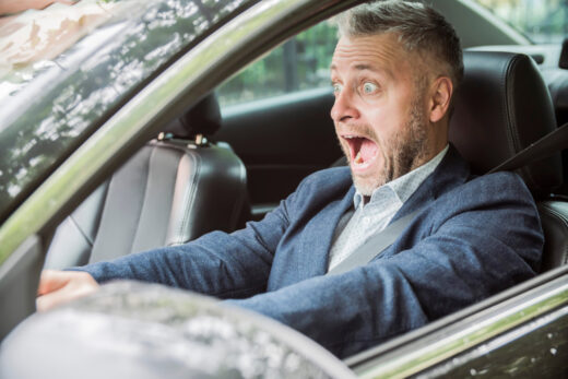 Shocked,scared,afraid,driver,in,a,car