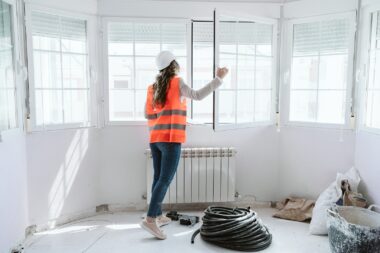 Inspector,or,architect,professional,woman,checking,windows,at,construction,site.