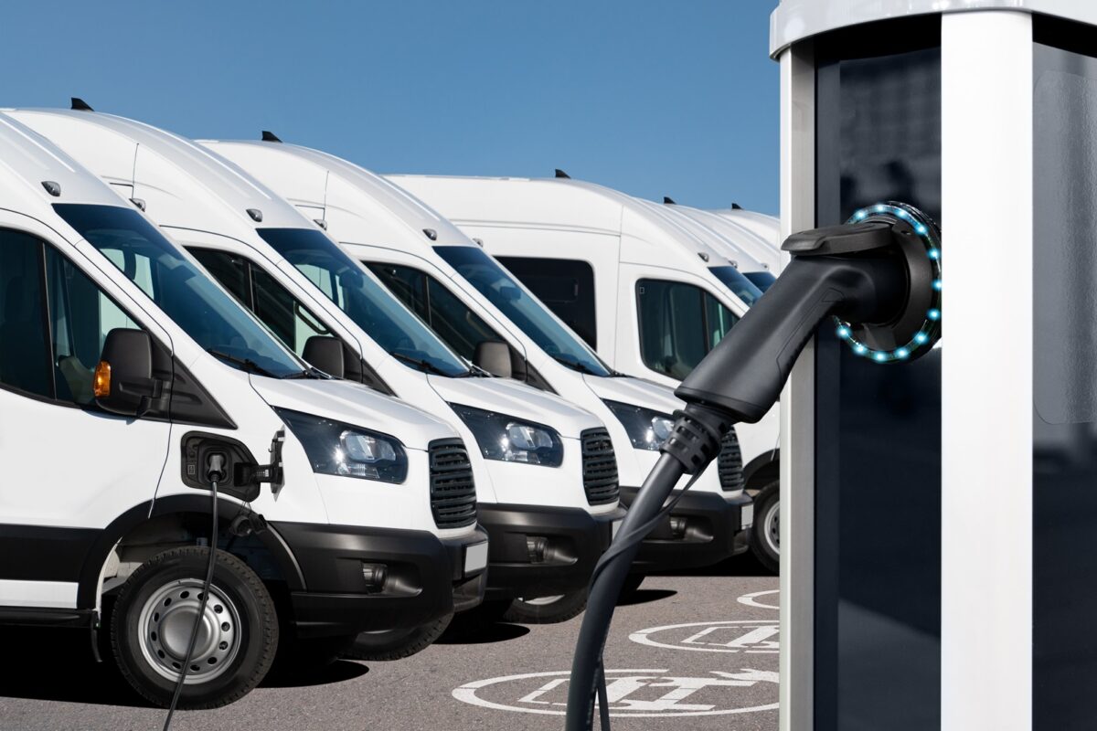 Electric,vehicles,charging,station,on,a,background,of,a,row